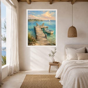 May include: A framed wall art print depicting a wooden pier extending into calm blue water. Two chairs sit on the dock next to a small white rowboat. In the distance, a sailboat is visible under a soft sky with light clouds and warm sunlight.