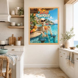May include: A framed wall art print featuring a skeleton wearing sunglasses, sitting at a swim-up bar in a tropical ocean setting, holding a cocktail with a straw. The text DEAD THIRSTY is displayed at the top in a stylized orange and blue font.