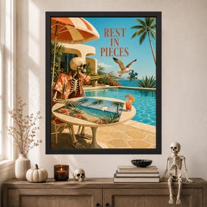 May include: A framed wall art print featuring a skeleton wearing a floral shirt and sunglasses at a poolside table, completing a puzzle. A seagull flies nearby holding a puzzle piece. The text reads REST IN PIECES above a blue swimming pool.