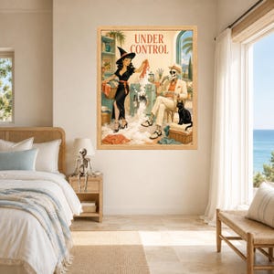 May include: A framed wall art print titled UNDER CONTROL featuring a vintage-style illustration of a person in a witch hat doing laundry with a skeleton in a suit and hat, a black cat, and soap suds overflowing from a washing machine.
