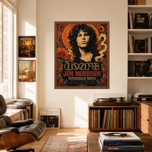 May include: A framed rectangular wall poster featuring a portrait of Jim Morrison surrounded by orange and red swirling patterns and floral motifs. The text reads The Doors, Jim Morrison, Psychedelic Nights, Live in Concert, Love, Freedom, Rock & Roll.