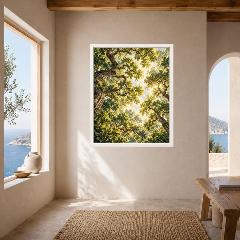 May include: A framed wall art print featuring a low-angle view of dense tree canopies with textured bark and green leaves, illuminated by bright sunlight filtering through the branches against a pale sky, presented in a simple white frame.