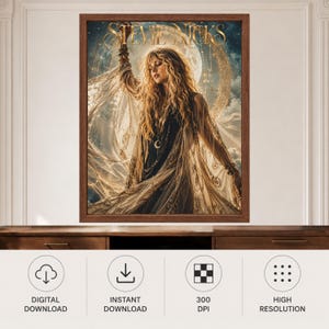 May include: A framed wall art print featuring a portrait of a person with long blonde hair, wearing a dark top and a sheer, flowing gold-toned garment. The text STEVIE NICKS is printed in gold at the top against a background of a large moon and clouds.