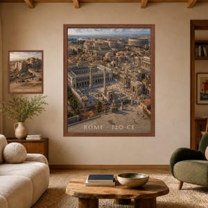 May include: A large framed wall art print depicting an aerial view of ancient Rome in 120 CE, featuring detailed architecture, columns, and the Colosseum. A smaller matching framed print is displayed to the left, both showing historical cityscapes.