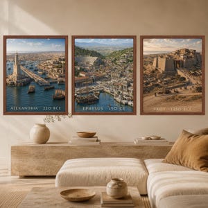 May include: Three framed wall art prints depicting historical cityscapes. The left print shows Alexandria 220 BCE with a lighthouse, the center print shows Ephesus 150 CE with a harbor, and the right print shows Troy 1250 BCE with a stone fortress.