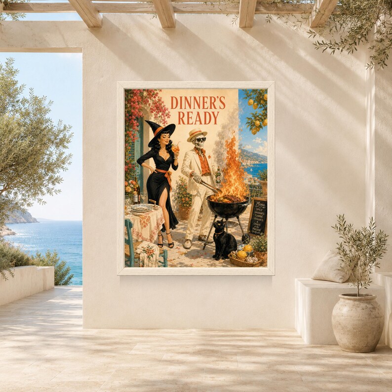 May include: A framed wall art print titled DINNER'S READY featuring a witch in a black dress and a skeleton in a white suit grilling food over a fire. A black cat sits nearby on a patio overlooking a blue sea with lemon trees in the background.