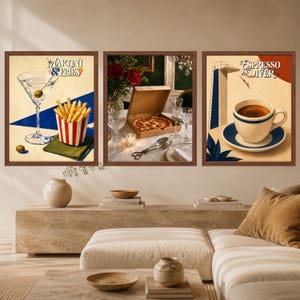 May include: A set of three framed wall art prints. The left print shows a martini glass and fries with the text 'Martini & Fries'. The centre print depicts a pizza box on a table. The right print shows a coffee cup with the text 'Espresso Diver'.