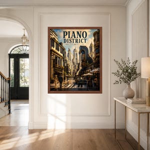 May include: A framed wall art print titled PIANO DISTRICT featuring a city street scene with buildings, pedestrians, a vintage car, and piano key patterns on the road, all rendered in a warm, golden-toned artistic style with dark brown frame.