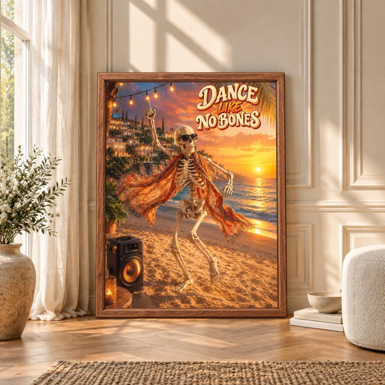 Framed Dance Like No Bones skeleton wall art showing a skeleton in sunglasses dancing on a sunset beach beside a speaker, string lights and a glowing Mediterranean coast.