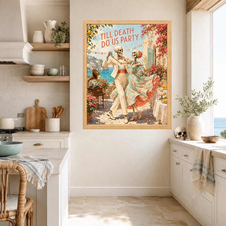 May include: A framed wall art print featuring two skeletons dancing on a terrace overlooking the sea. The text TILL DEATH DO US PARTY is printed at the top. The scene includes a vintage record player, flowers, and a table with refreshments.