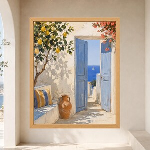 May include: A framed wall art print depicting a Mediterranean scene with a lemon tree, a terracotta vase, and a stone bench with a striped cushion. An open blue door reveals a view of the blue sea and a sailboat under a bright clear sky.