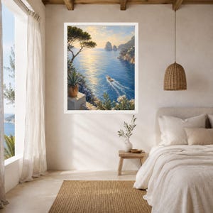 May include: A framed wall art print depicting a coastal Mediterranean scene with a sunlit blue sea, rocky cliffs, a small boat leaving a wake, and a foreground featuring a potted agave plant and a pine tree under a warm, golden sky.