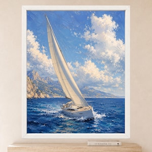 May include: A framed oil painting depicting a white sailboat with a large sail navigating deep blue ocean waters. The scene features a bright blue sky filled with fluffy white clouds and a rugged, mountainous coastline in the background.