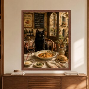 Framed black cat kitchen wall art showing a black cat seated at an Italian trattoria table with ravioli, red wine and bread, surrounded by checked tablecloths, handwritten menus and a warm old-world restaurant interior.