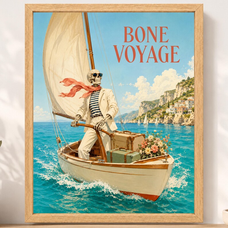 May include: A framed art print featuring a skeleton wearing a beige suit, striped shirt, and red scarf, steering a sailboat on blue water. The text BONE VOYAGE is printed in red. A bouquet of flowers and two suitcases sit on the boat deck.