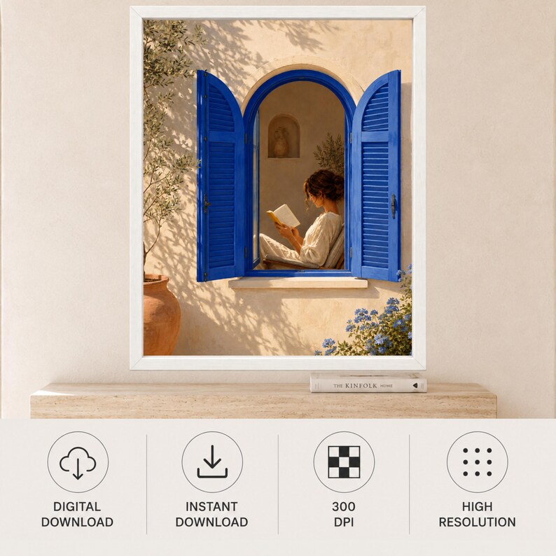 May include: A framed wall art print featuring an arched window with vibrant blue shutters set into a beige stucco wall. A person sits inside the window reading a book. To the left is a terracotta pot with a small tree and blue flowers below.