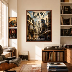 May include: A framed wall art print titled Piano District featuring a city street scene with tall buildings, a vintage car, and pedestrians. The artwork is displayed in a brown frame on a wall alongside two smaller music-themed posters.