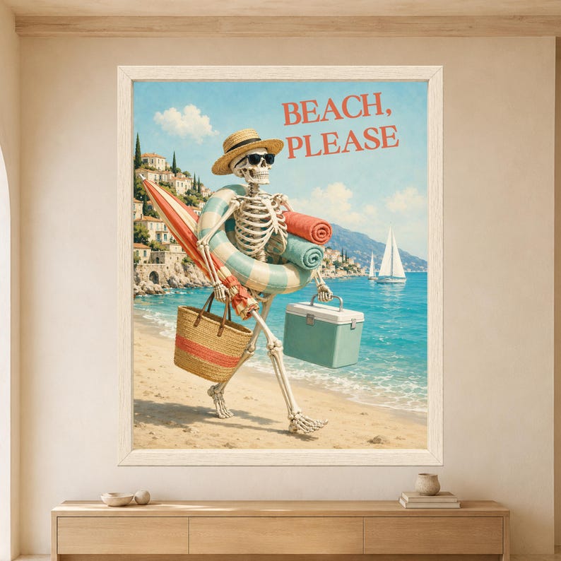 Framed Beach Please skeleton wall art featuring a sunglasses-wearing skeleton carrying a swim ring, towels, beach umbrella, woven bag and cooler beside a sunny Mediterranean coastline.
