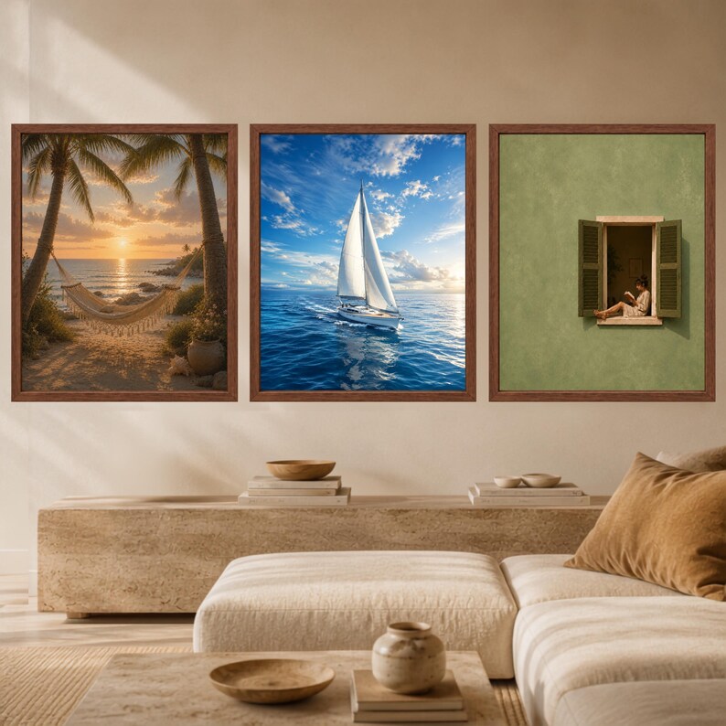 May include: A set of three framed wall art prints. The left print shows a hammock between palm trees at sunset. The center print features a white sailboat on blue water under a cloudy sky. The right print depicts a person sitting in a window.