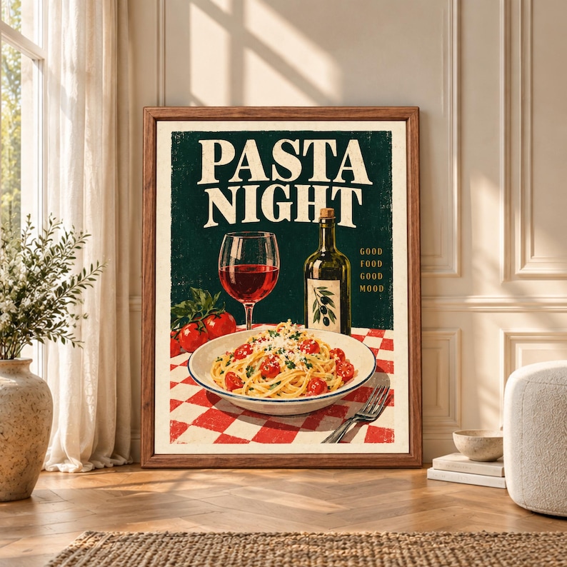 Framed Pasta Night kitchen wall art featuring spaghetti with tomatoes, red wine and olive oil on a red checkered table beneath bold cream lettering on dark green.