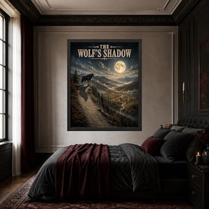 May include: A framed wall art print titled THE WOLF'S SHADOW, featuring a dark, detailed landscape illustration of a lone wolf standing on a cliff edge overlooking a forested valley under a bright full moon in a cloudy night sky.