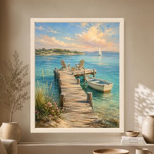Framed coastal wall art showing a weathered wooden dock with two Adirondack chairs, a small white rowboat, turquoise water and a distant sailboat beneath a soft summer sky.