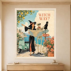 Framed Witch Way skeleton wall art featuring a stylish witch and sunglasses-wearing skeleton reading a road map beside a black cat, vintage mint scooter and Mediterranean coastal road signs.