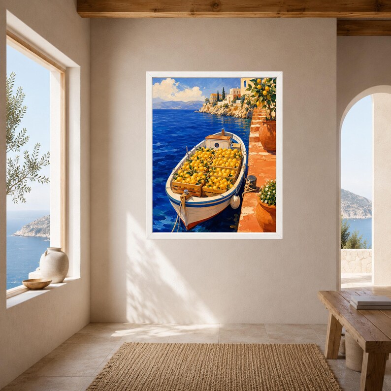 May include: A framed wall art print depicting a small white boat filled with wooden crates of bright yellow lemons floating on deep blue Mediterranean water, next to a terracotta-colored stone pier with potted lemon trees and distant buildings.
