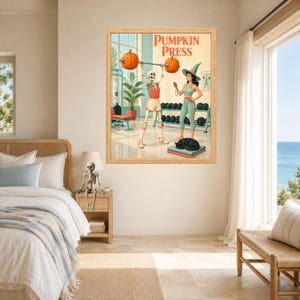May include: A framed wall art print titled PUMPKIN PRESS featuring a skeleton lifting a barbell with pumpkins as weights, accompanied by a person in a witch hat and athletic wear, with a black cat resting on a mat in a gym setting.