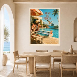May include: A framed wall art print featuring a skeleton wearing a floral shirt sitting at a table by a swimming pool. The skeleton is working on a puzzle. A seagull flies nearby holding a puzzle piece. The text REST IN PIECES is at the top.