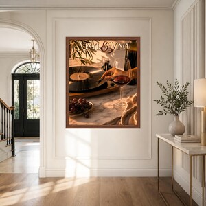 May include: A framed wall art print titled Vinyl & Vino featuring a black vinyl record on a turntable, a glass of red wine, and a small bowl of dark grapes on a marble surface, illuminated by warm sunlight casting long shadows across the scene.