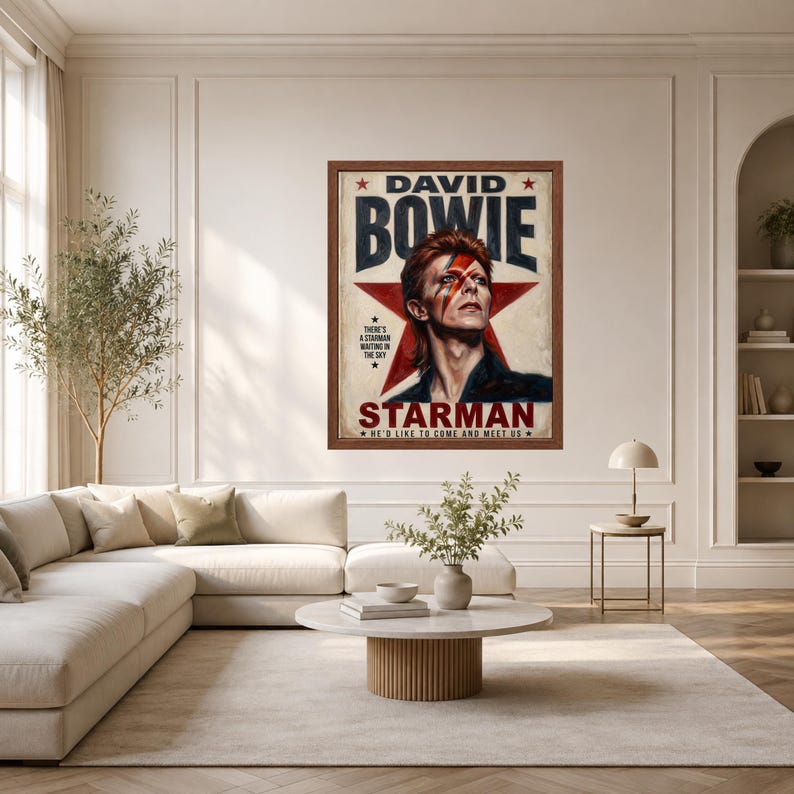May include: A framed rectangular wall poster featuring a portrait of David Bowie with a red lightning bolt across the face. The text reads DAVID BOWIE, STARMAN, and There's a starman waiting in the sky. He'd like to come and meet us.