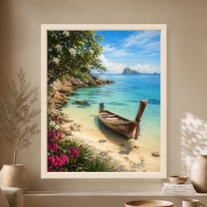 Framed tropical coastal wall art showing a traditional wooden longtail boat in clear turquoise water beside a sandy beach, flowering greenery and rocky islands under a bright blue sky.