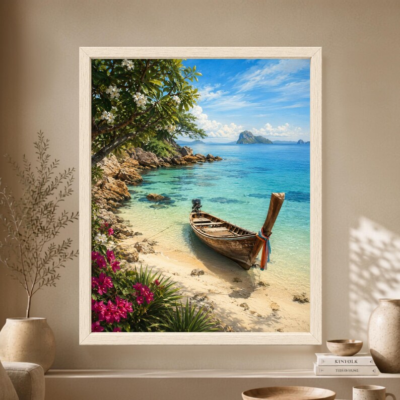 Framed tropical coastal wall art showing a traditional wooden longtail boat in clear turquoise water beside a sandy beach, flowering greenery and rocky islands under a bright blue sky.