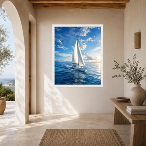 May include: A framed wall art print featuring a white sailboat with a single mast sailing on deep blue ocean waters under a bright sky with scattered white clouds and a visible sun glow on the horizon, displayed in a white rectangular frame.