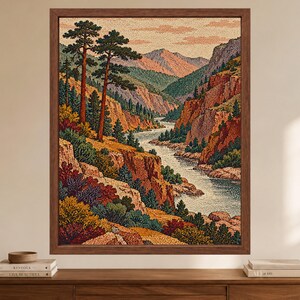 以下が含まれることがあります： 深い峡谷を流れる川を描いた点描画スタイルの額入りウォールアート。背の高い松の木、オレンジや茶色の色調の岩壁、緑や紫の色合いの密集した植物が描かれた風景画で、木製のフレームに収められています。