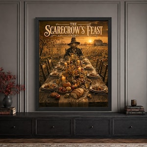 Framed scarecrow Halloween wall art featuring a mysterious scarecrow seated at the end of a rustic outdoor harvest feast table filled with autumn food, pumpkins, candles and flowers beside a cornfield and farmhouse at sunset.