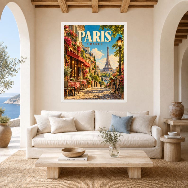 May include: A framed wall art print featuring a vibrant illustration of a Parisian street scene with a cafe, a bicycle, and the Eiffel Tower in the distance. The text PARIS FRANCE is printed in large gold letters at the top of the artwork.