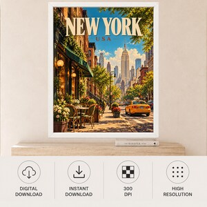 May include: A framed wall art print depicting a New York City street scene with the text NEW YORK USA at the top. The image features a sidewalk cafe with green awnings, lush trees, and a yellow taxi driving down a sunny city street with skyscrapers.