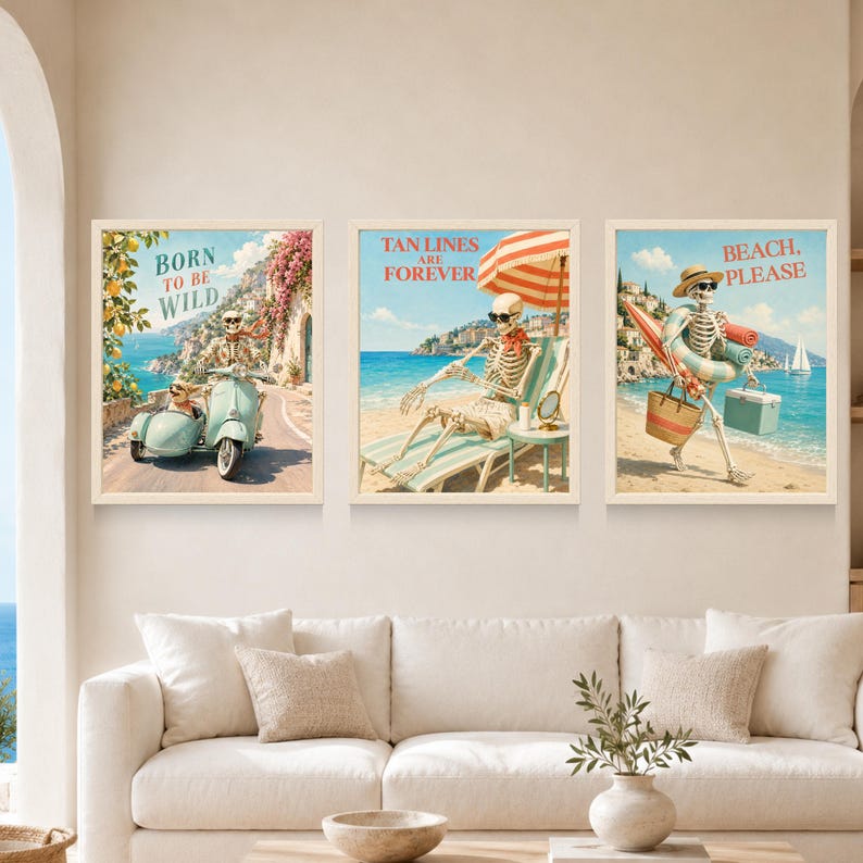 May include: A set of three framed wall art prints featuring skeletons in beach settings. The first shows a skeleton on a light blue scooter with the text BORN TO BE WILD. The second shows a skeleton on a lounge chair with the text TAN LINES ARE FOREVER. The third shows a skeleton walking on the beach with the text BEACH, PLEASE.