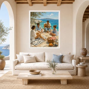 May include: A framed wall art print depicting three people sitting on a rocky Mediterranean coastline. One person plays an acoustic guitar while others relax on a striped blanket. The scene includes a woven basket, oranges, and a blue sea background.