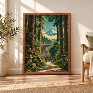 Framed Japanese landscape wall art showing a forest path lined with stone lanterns leading toward a red shrine beneath tall cedar trees with Mount Fuji rising in the distance.