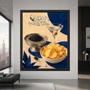 Framed Caviar and Potato Chips wall art showing black caviar in a silver bowl beside a martini with olives and a bowl of golden potato chips on a cream and cobalt blue background.