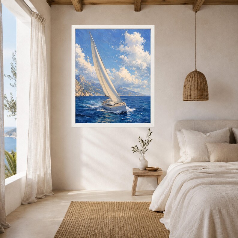 May include: A framed wall art print depicting a white sailboat navigating deep blue ocean waters under a bright sky with fluffy white clouds. The scene features distant rocky cliffs and a clear horizon, captured in a painterly style with visible brushstrokes.