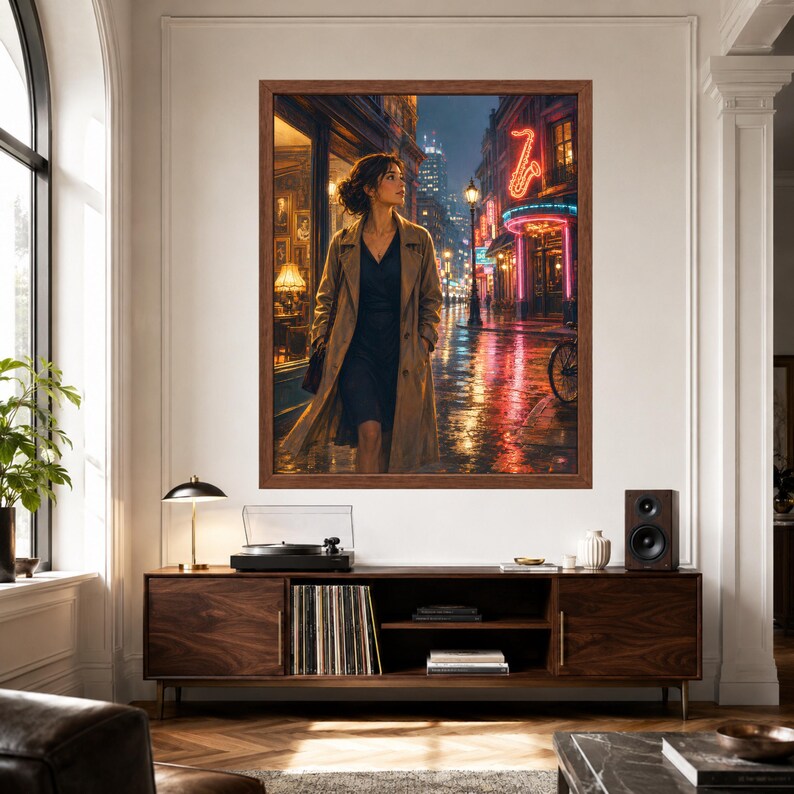 May include: A framed wall art print depicting a person in a tan trench coat walking down a rain-slicked city street at night. The scene features glowing neon signs, including a saxophone shape, and reflections on the wet pavement in warm tones.