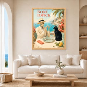 Peut inclure: Une impression d'art encadr&eacute;e intitul&eacute;e BONE TO PICK repr&eacute;sentant un squelette en costume et chapeau beiges assis &agrave; une table avec un chat noir. La sc&egrave;ne montre un paysage c&ocirc;tier avec une ar&ecirc;te de poisson, une serviette rouge et deux citrons.