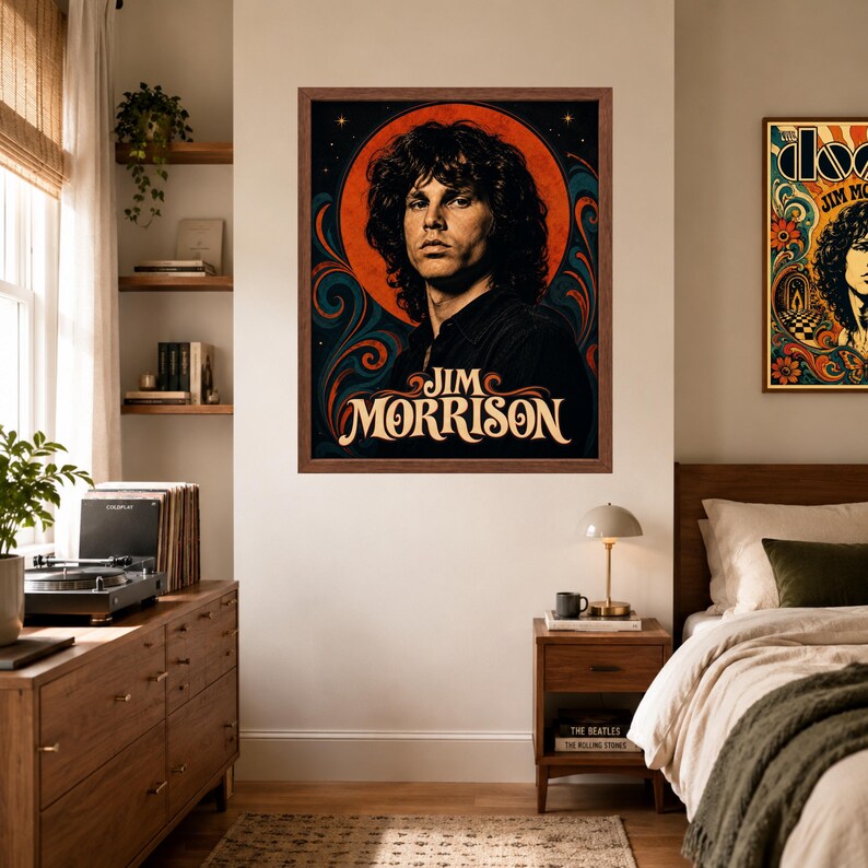May include: A framed wall poster featuring a portrait of Jim Morrison with long dark hair, set against a vibrant orange circular background with swirling blue and black patterns. The text JIM MORRISON is printed in a stylized cream-colored font.