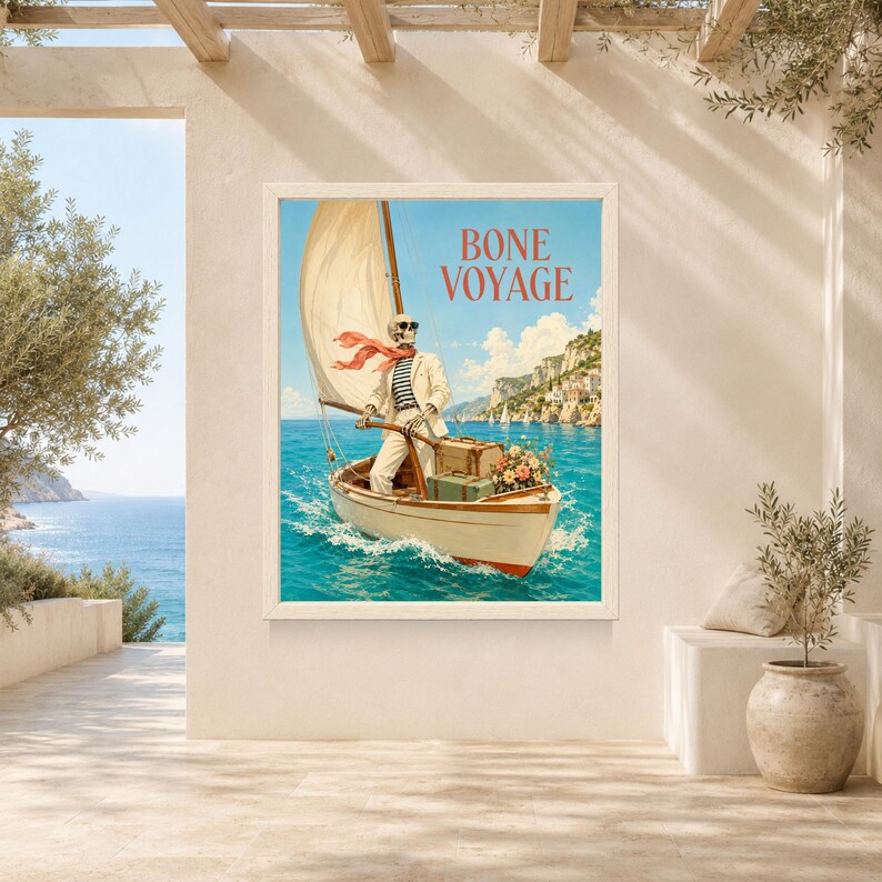 May include: A framed wall art print featuring a skeleton wearing a white suit, sunglasses, and a red scarf, steering a sailboat on blue water. The text BONE VOYAGE is printed in red at the top. The boat carries a suitcase and a bouquet of flowers.