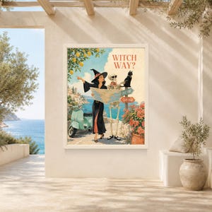Puede incluir: Una l&aacute;mina enmarcada titulada WITCH WAY? que muestra a una bruja con vestido negro y un esqueleto junto a un scooter verde claro. Sostienen un mapa bajo un limonero con un gato negro. Dos se&ntilde;ales indican Coast Road y Cliff Road.