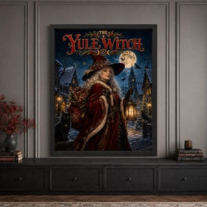 Framed Yule witch Christmas wall art featuring a silver-haired witch in a red winter cloak carrying gifts and a lantern through a snowy gothic village, accompanied by a black cat beneath a full moon with “The Yule Witch” typography.